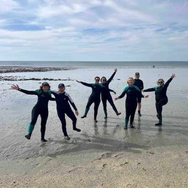 Groupe de longe-côte sur le sable